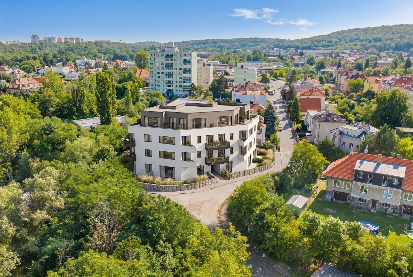Letecký pohled na Viladům Okružní a okolní zástavbu na rozhraní Modřan a Komořan